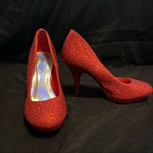 Red sparkly heels
